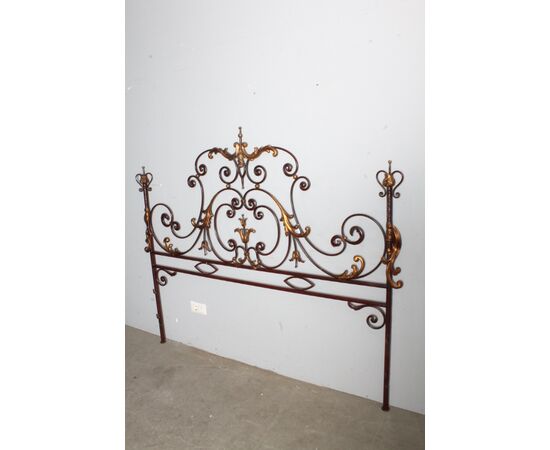 Elegant antique wrought iron double bed headboard. Gold and purple, circa 1930. Dimensions: cm180 . h 155