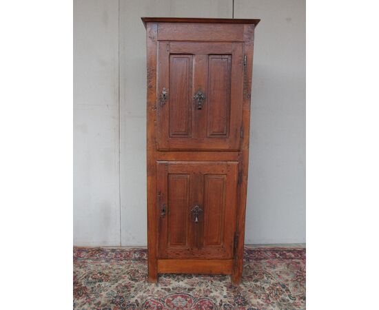 Two-door cabinet in oak, 18th century, France, restored. Dimensions: L65xW53xH174 cm