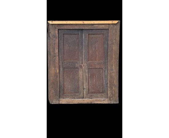 Two-door wall-mounted walnut cabinet.
