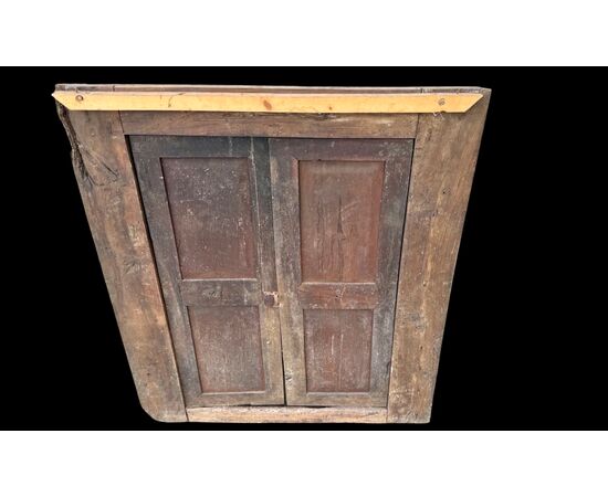 Two-door wall-mounted walnut cabinet.