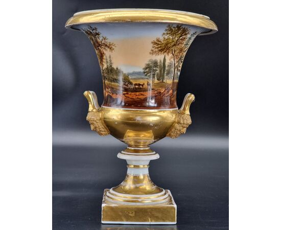 Gilded and hand-painted porcelain cup with hunting scenes, 19th century