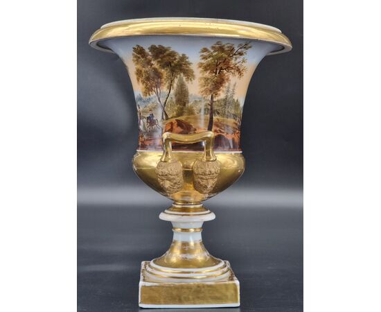 Gilded and hand-painted porcelain cup with hunting scenes, 19th century