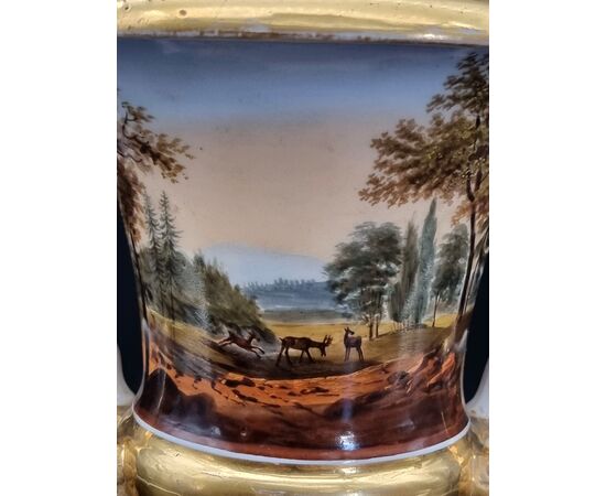 Gilded and hand-painted porcelain cup with hunting scenes, 19th century