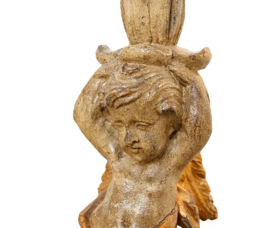 Pair of candle-holding putti