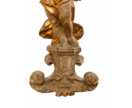 Pair of candle-holding putti