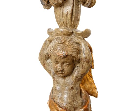 Pair of candle-holding putti