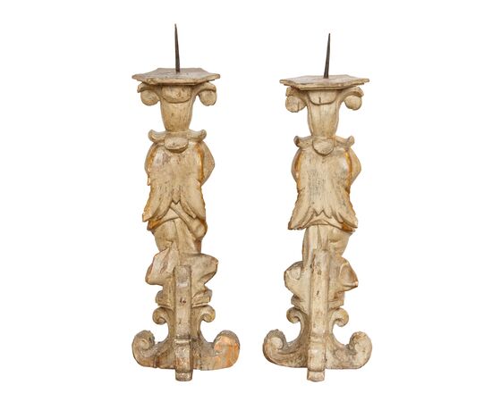 Pair of candle-holding putti