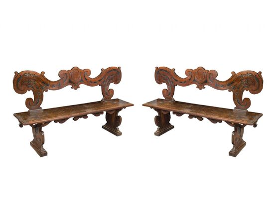 Pair of noble benches in solid carved walnut. Northern Italy, 17th century.