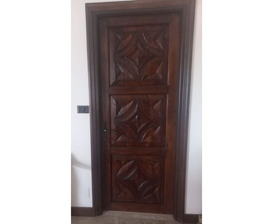 Door with carved panels