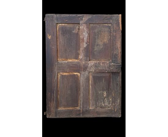 Carved walnut door panel with four panels.