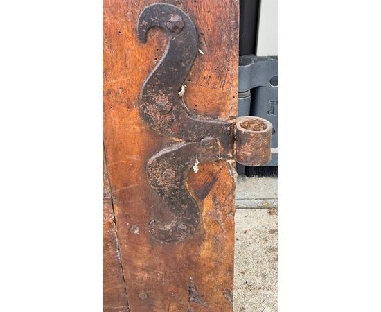 Pair of walnut doors with four engraved diamond panels.