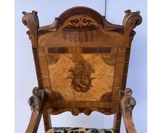 Carved, veneered and inlaid wooden armchair. Italy, 17th-18th century.