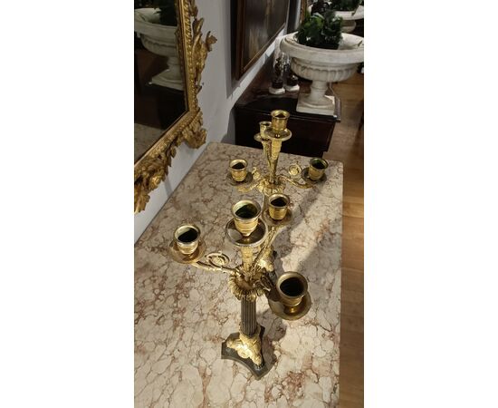 Pair of Charles X bronze candlesticks