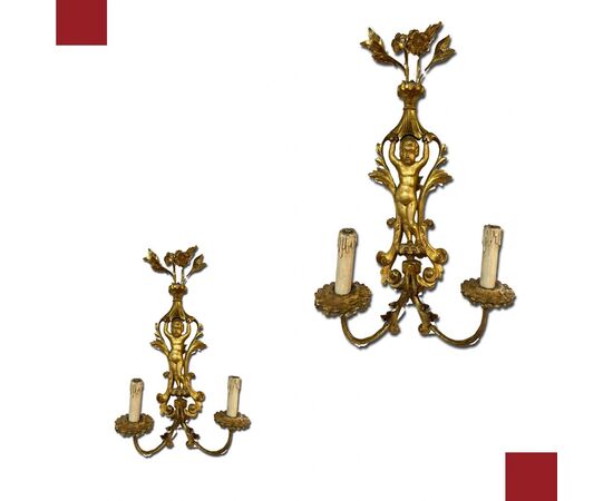 COPPIA DI APPLIQUES IN LEGNO INTAGLIATO E DORATO, META' DEL XIX SECOLO