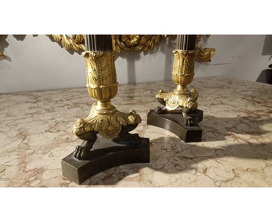 Pair of Charles X bronze candlesticks