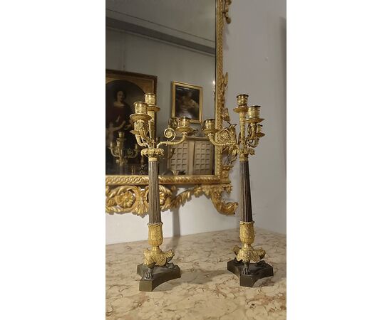 Pair of Charles X bronze candlesticks
