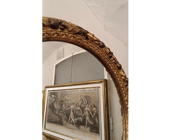 Round gilded wood mirror, second half of the 19th century