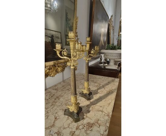 Pair of Charles X bronze candlesticks