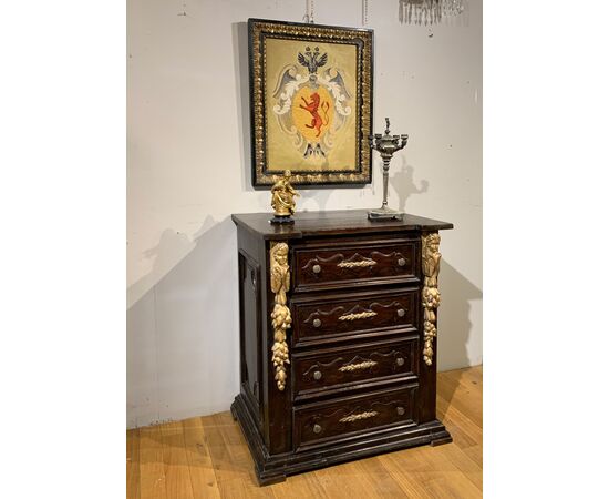 Small walnut chest of drawers with gilded carvings, late 16th century