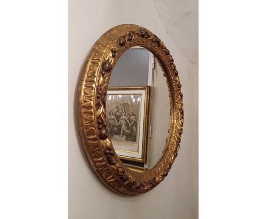 Round gilded wood mirror, second half of the 19th century