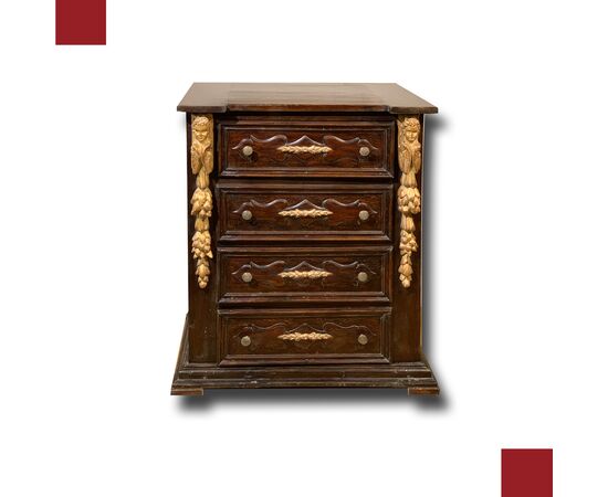 Small walnut chest of drawers with gilded carvings, late 16th century