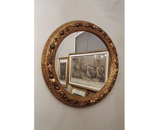 Round gilded wood mirror, second half of the 19th century