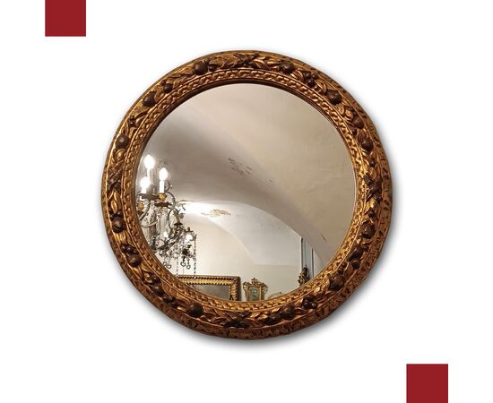 Round gilded wood mirror, second half of the 19th century