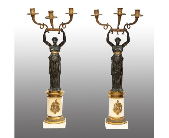 Pair of Charles X candlesticks/Flambeaux in patinated bronze and white statuary marble. France, early 19th century.