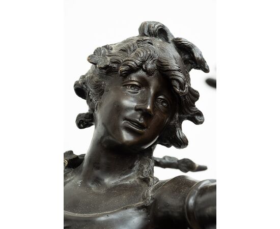 Antique patinated bronze sculpture depicting the "Nimphe de bois" signed "Louis Moreau" resting on a red Levanto marble base. France 19th century.