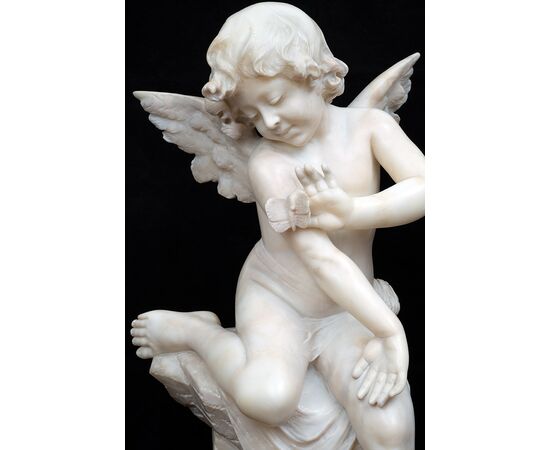 Antique alabaster sculpture of Napoleon III depicting a winged cherub. France, 19th century.