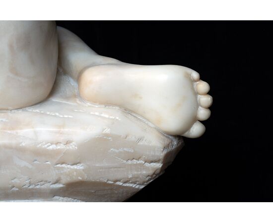 Antique alabaster sculpture of Napoleon III depicting a winged cherub. France, 19th century.