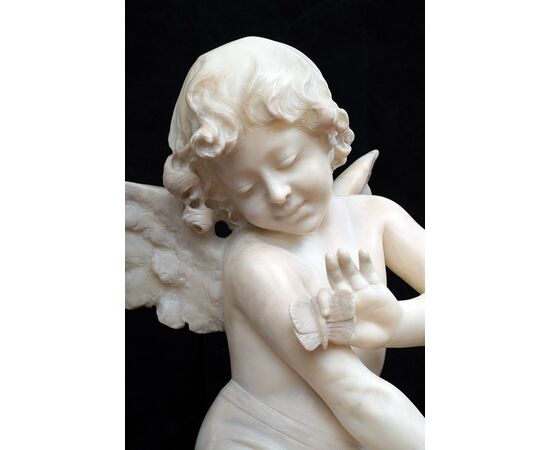 Antique alabaster sculpture of Napoleon III depicting a winged cherub. France, 19th century.