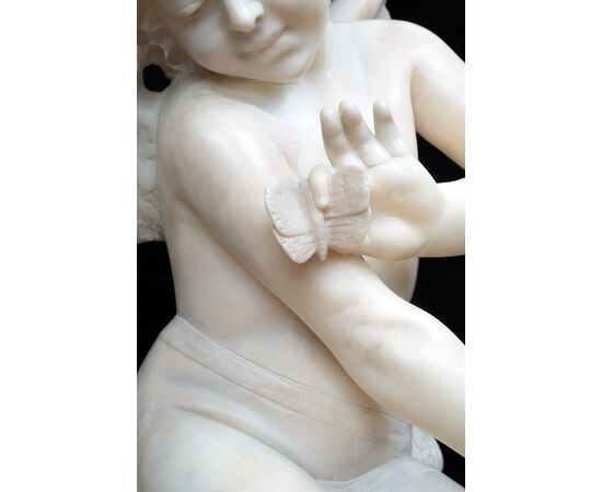 Antique alabaster sculpture of Napoleon III depicting a winged cherub. France, 19th century.