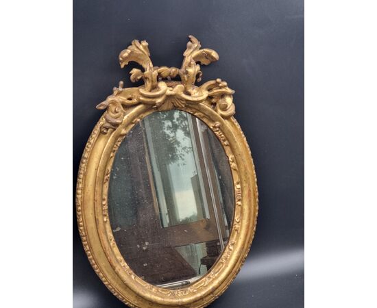 Carved and gilded oval frame – Bologna, early 18th century