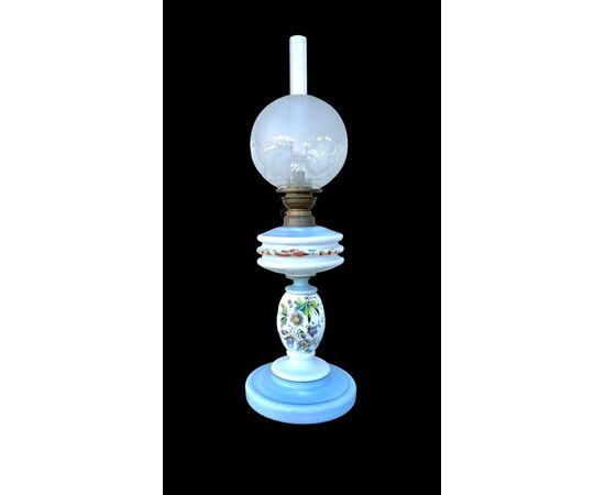 Milk glass oil lamp with light blue decoration and floral motifs. Kosmos Brenner manufacture. Germany.