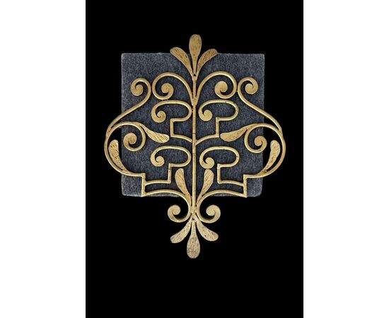 Wrought iron and gilded coat rack wall light.