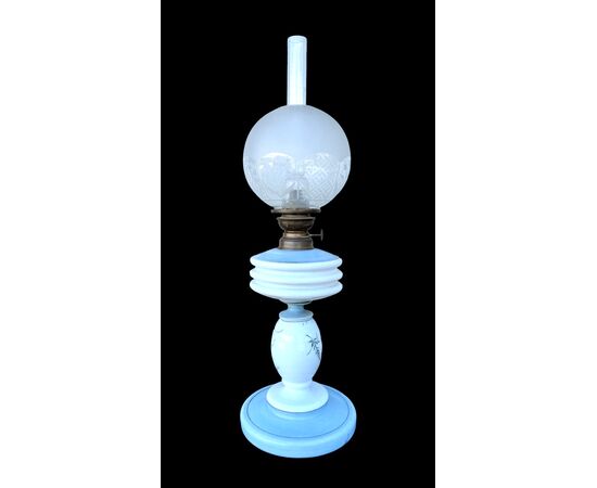 Milk glass oil lamp with light blue decoration and floral motifs. Kosmos Brenner manufacture. Germany.