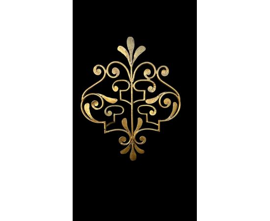 Wrought iron and gilded coat rack wall light.