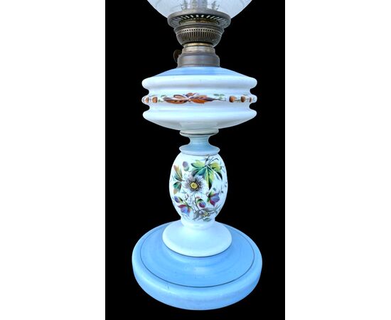 Milk glass oil lamp with light blue decoration and floral motifs. Kosmos Brenner manufacture. Germany.