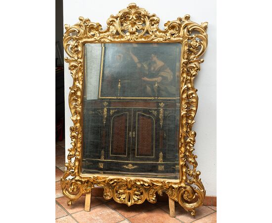 Specchiera antica stile Luigi XV in legno dorato e intagliato. Firenze XIX secolo.