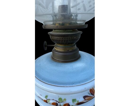 Milk glass oil lamp with light blue decoration and floral motifs. Kosmos Brenner manufacture. Germany.