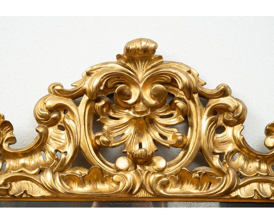 Specchiera antica stile Luigi XV in legno dorato e intagliato. Firenze XIX secolo.