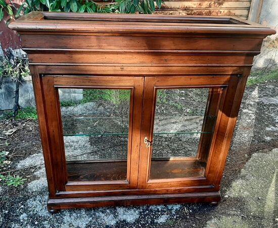 Walnut display cabinet with planter