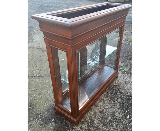 Walnut display cabinet with planter