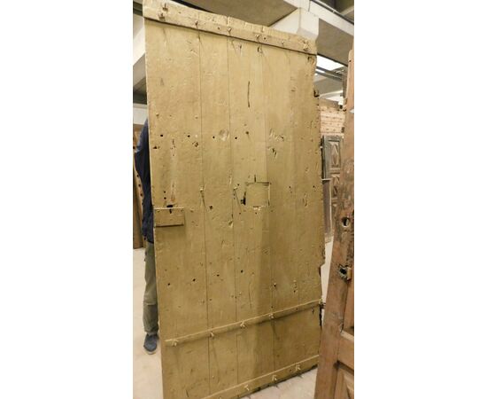 PTCI474 - Studded small door, with sculpted panels, in walnut wood, 18th century, measurements cm W 114 x H 238