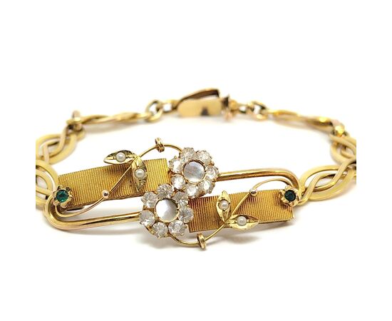 Bracciale in oro con smeraldi e diamanti