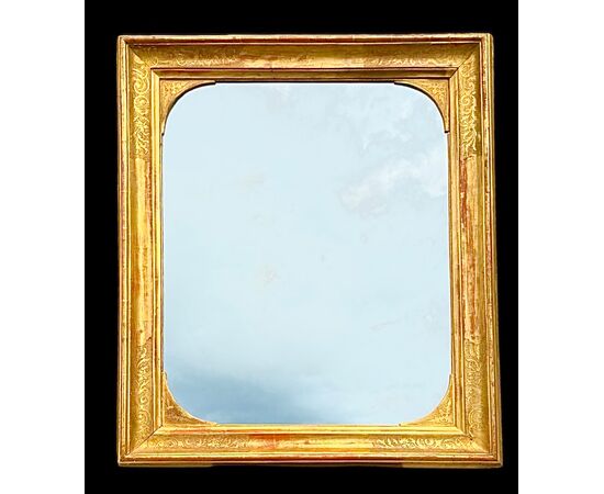 Carved wooden mirror-frame.