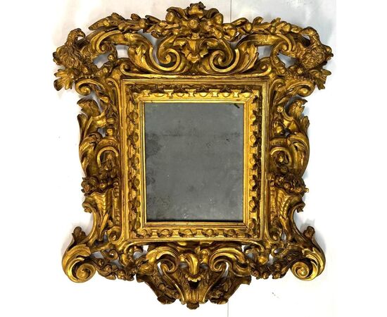 Specchiera in legno scolpito, intagliato e dorato, Toscana, inizi del XVIII secolo