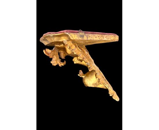Corner shelf in carved wood and gold leaf. Florence.