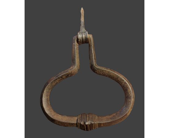 Lombard wrought iron door knocker with strike plate, late 17th century